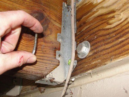 Improper joist hanger nails