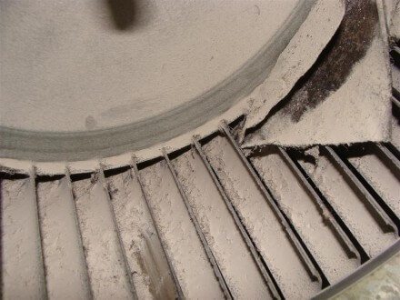 Blower fan caked with drywall dust