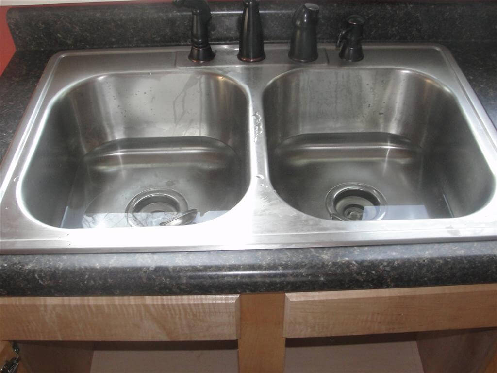 kitchen sink drain keeps clogging