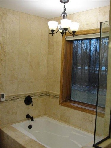 Chandelier over bath tub in Chaska