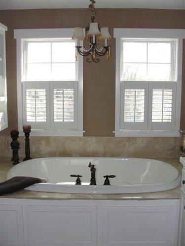 Chandelier over bath tub in Victoria