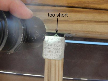 Decks - short nails at joist hanger labeled
