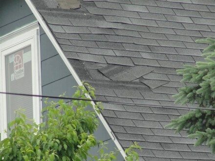 Damaged shingles close-up