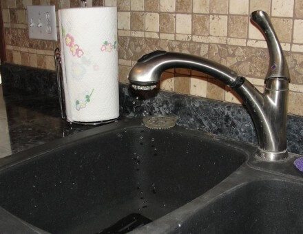 Minimal water flow at kitchen sink faucet
