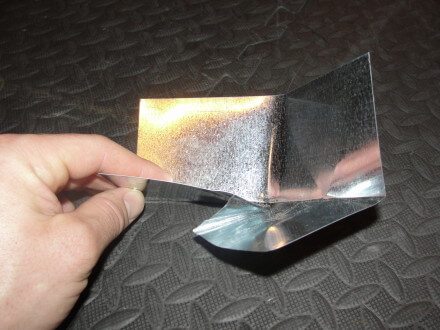 Initial bend in step flashing