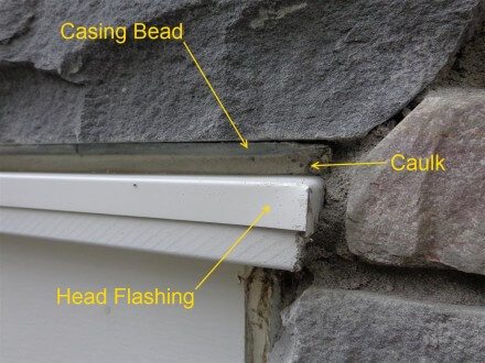 Exterior - Caulked head flashing