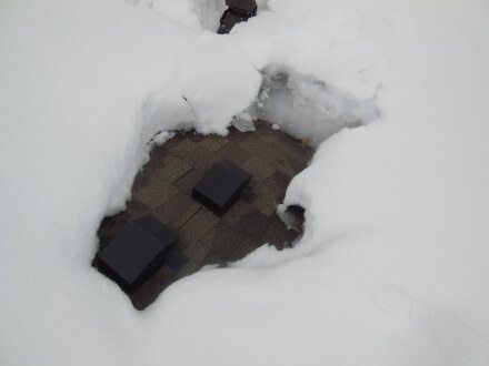 Bath fans at roof with ice dam