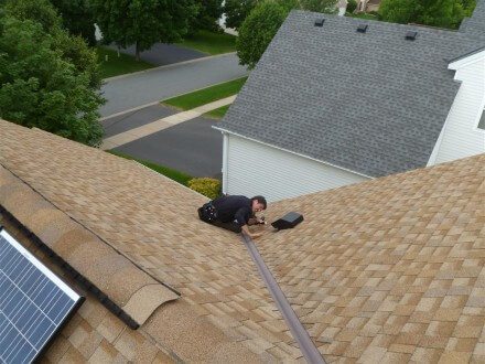 home inspector on roof