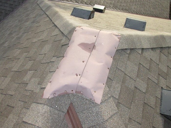 Roof - bad flashing at peak of roof