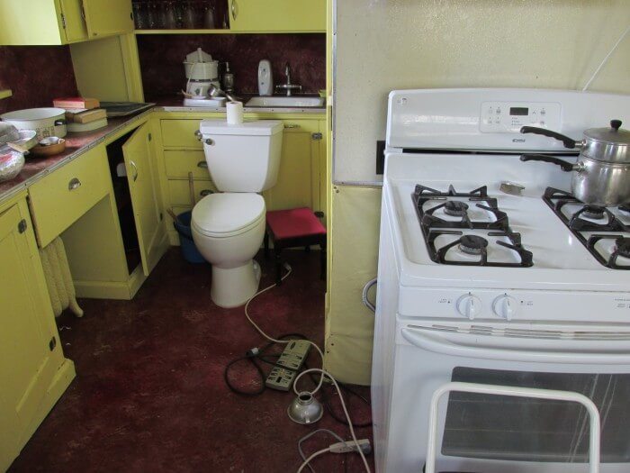 Toilet in kitchen