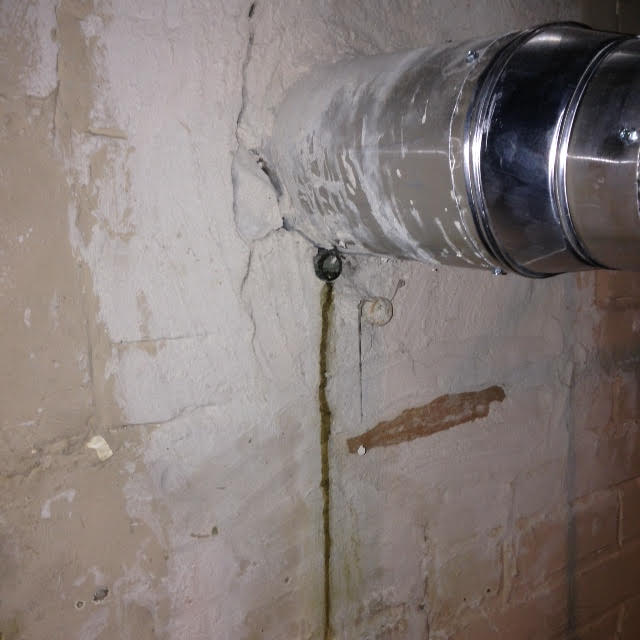 Q A Why Does Water Leak Through The, Leak Around Pipe In Basement Wall